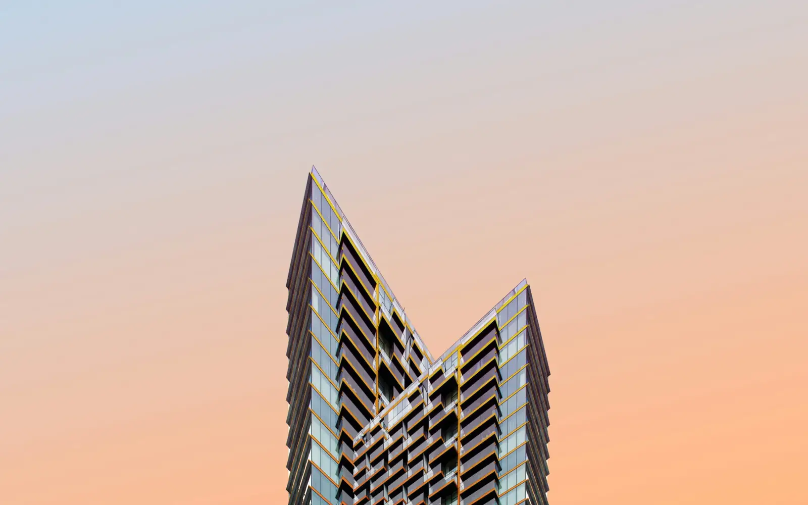 Angular architecture against an amber sky